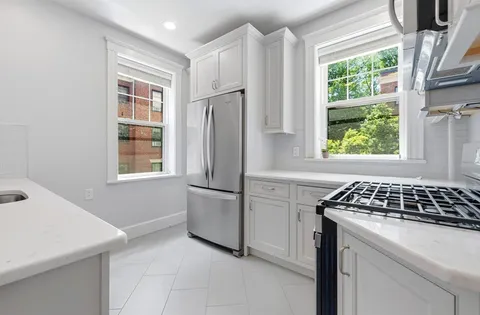 storage and utility room with a window