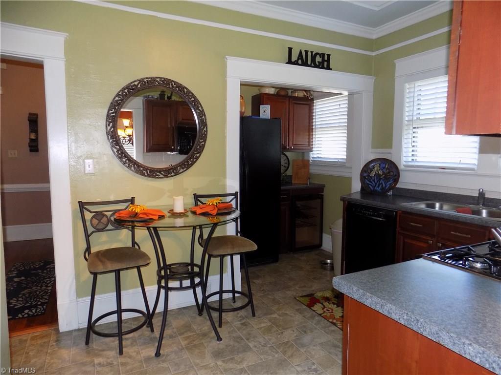 1013 North Hamilton Street High Point, NC 27262 - Photo 11 of 30 Bright and Inviting Kitchen: Pantry, Nook for Refrigerator & Wine Cooler. Gas Stove.