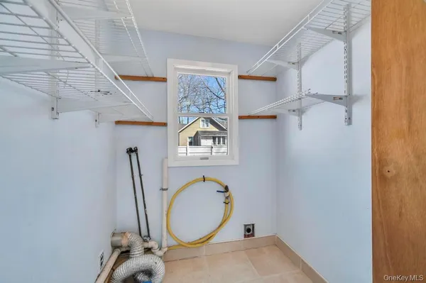 a bathroom with a sink a mirror and shower