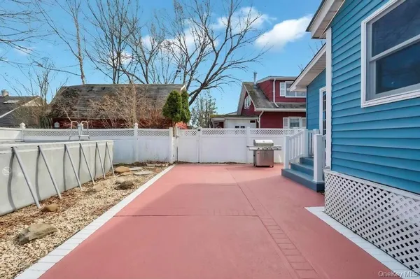 a view of a backyard and a house