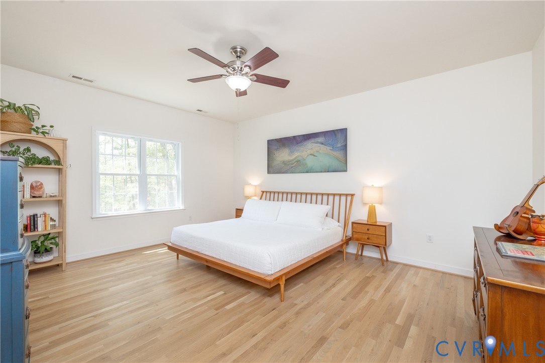 15618 Rowlett Road Chesterfield, VA 23838 - Photo 7 of 29 a bedroom with a bed and a window