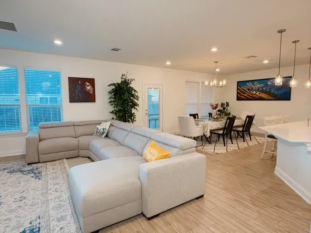 a kitchen with a table and chairs in it