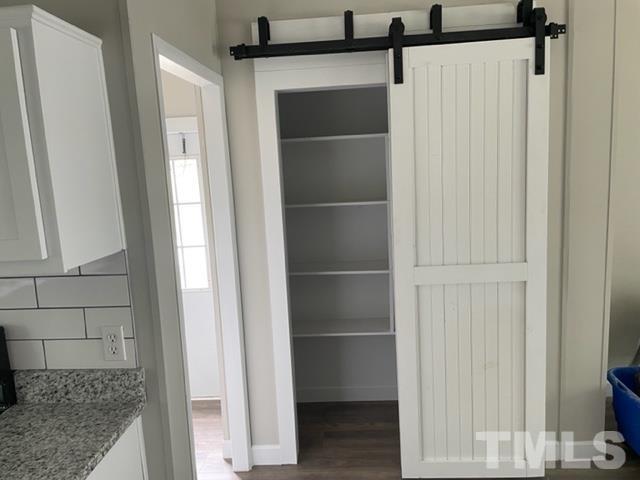 860 Thanksgiving Fire Road Selma, NC 27576 - Photo 14 of 23 a view of walk in closet