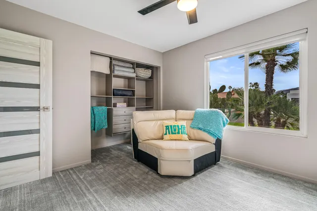 a front view of a house with sitting space