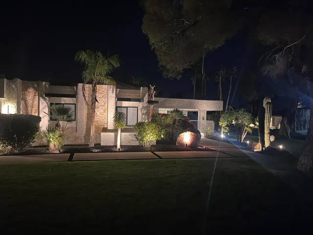 a kitchen with a sink cabinets and stainless steel appliances