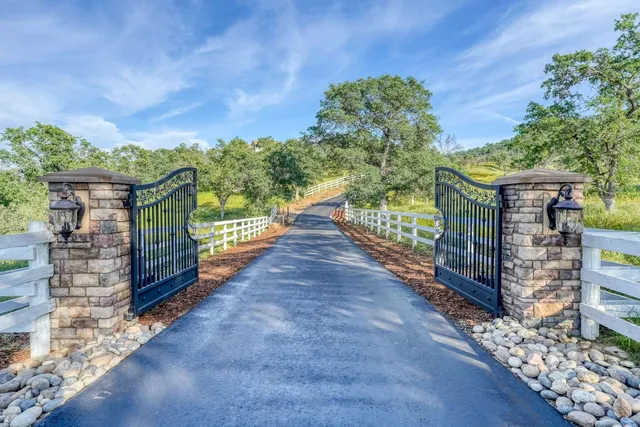 a kitchen with a dining table and chairs