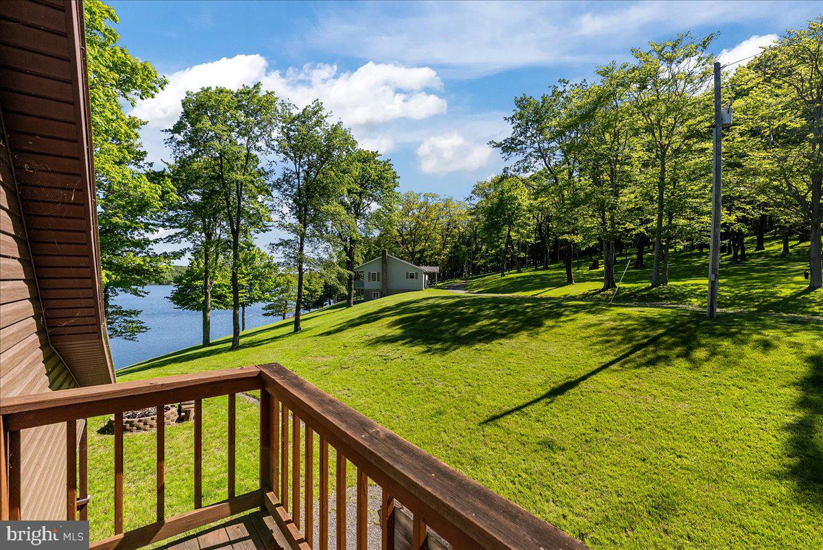 663 Bear Woods Road Mount Storm, WV 26739 - Photo 35 of 73 Serene lakeside retreat awaits you.
