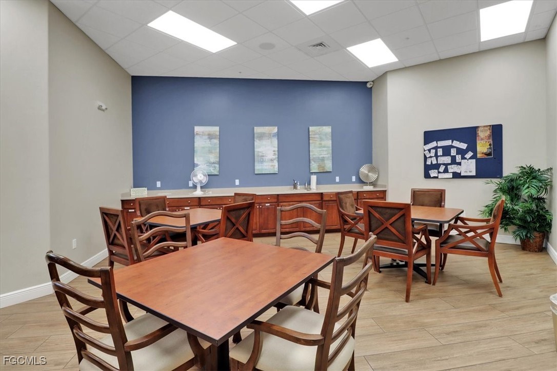 19674 Villa Rosa Loop Estero, FL 33967 - Photo 32 of 33 a view of a dining room with furniture