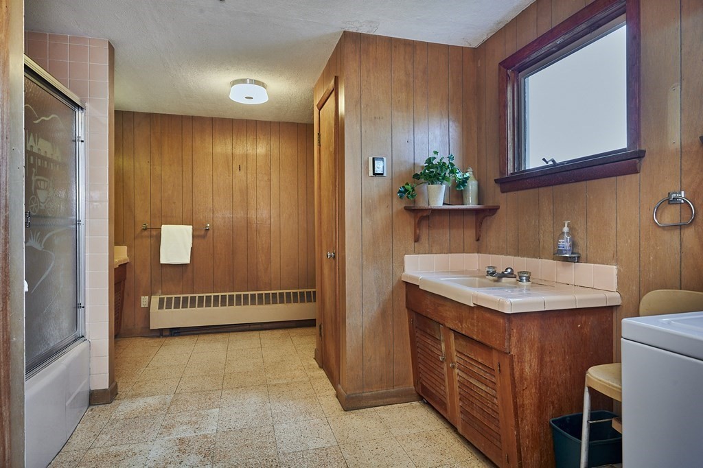 59 Pomeroy Meadow Road Southampton, MA 01073 - Photo 11 of 42 a bathroom with a sink and a mirror