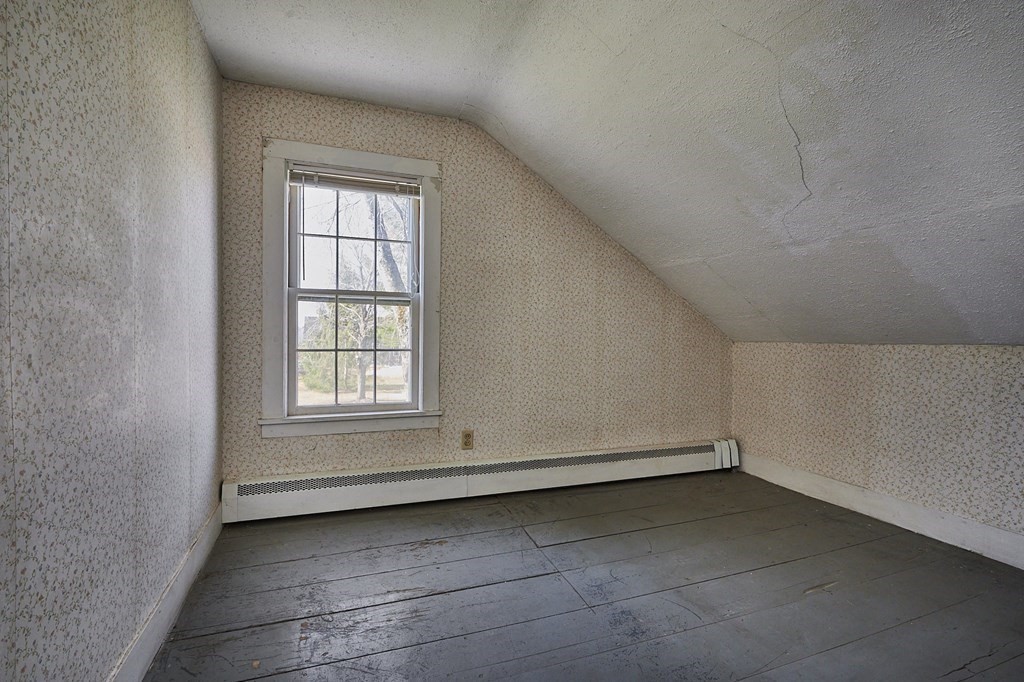 59 Pomeroy Meadow Road Southampton, MA 01073 - Photo 23 of 42 an empty room with a empty space and window