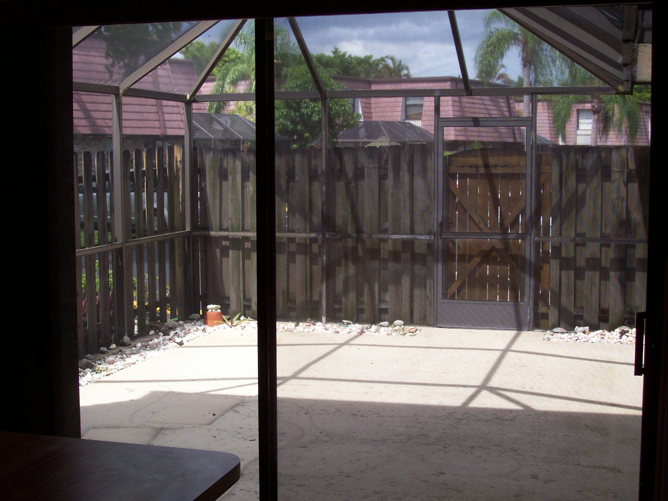 7685 Courtyard Run West, Unit 7685 Boca Raton, FL 33433 - Photo 3 of 24 SCREENED PATIO