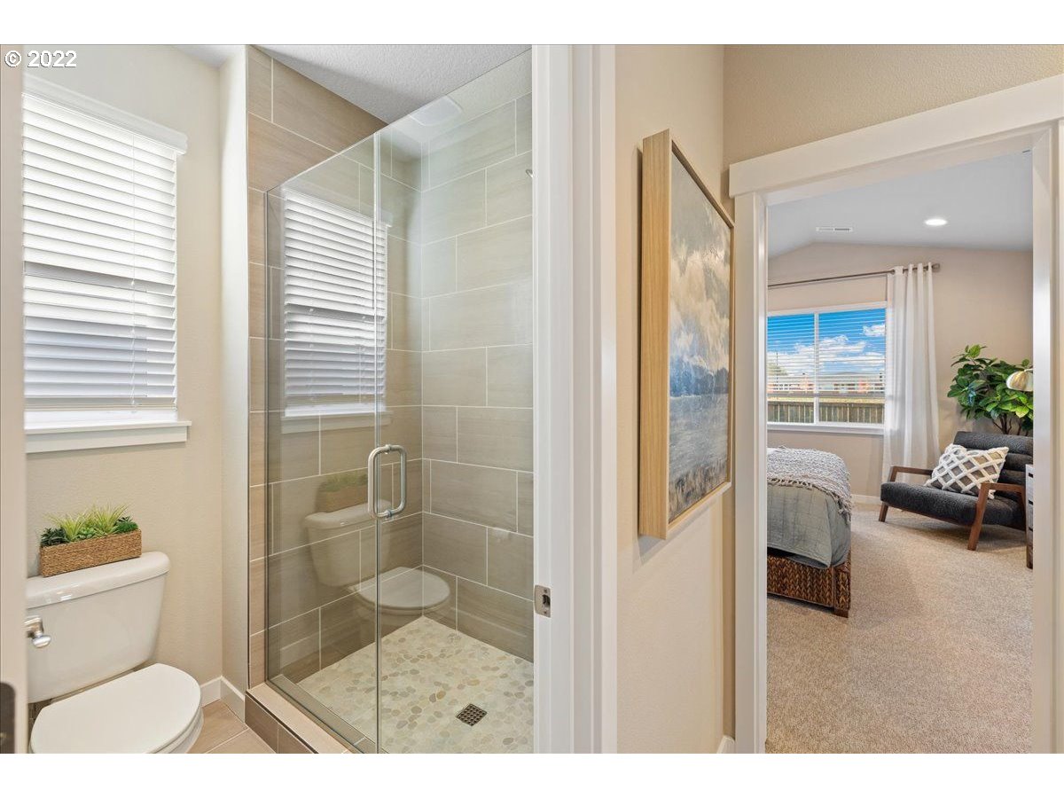 517 North 88th Drive, Unit LT 22 Ridgefield, WA 98642 - Photo 18 of 19 a bathroom with a toilet and a shower