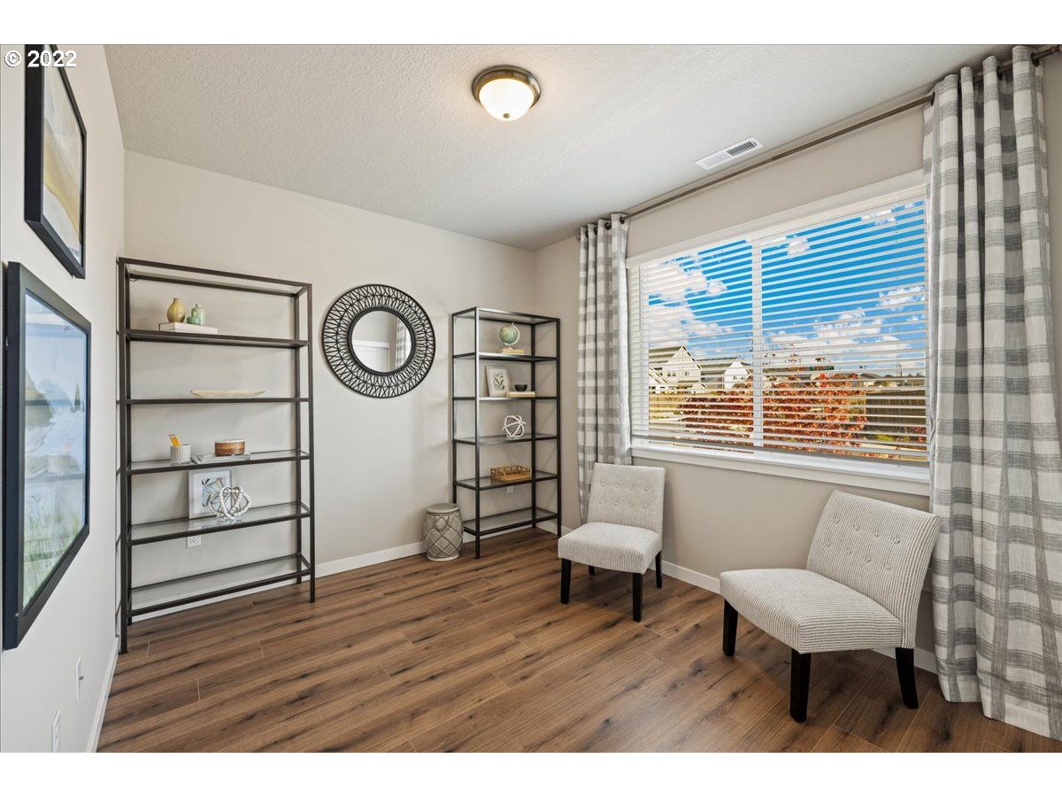 517 North 88th Drive, Unit LT 22 Ridgefield, WA 98642 - Photo 5 of 19 a view of a room with furniture and wooden floor