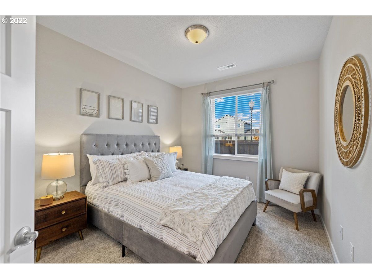 517 North 88th Drive, Unit LT 22 Ridgefield, WA 98642 - Photo 7 of 19 a bedroom with a bed and window