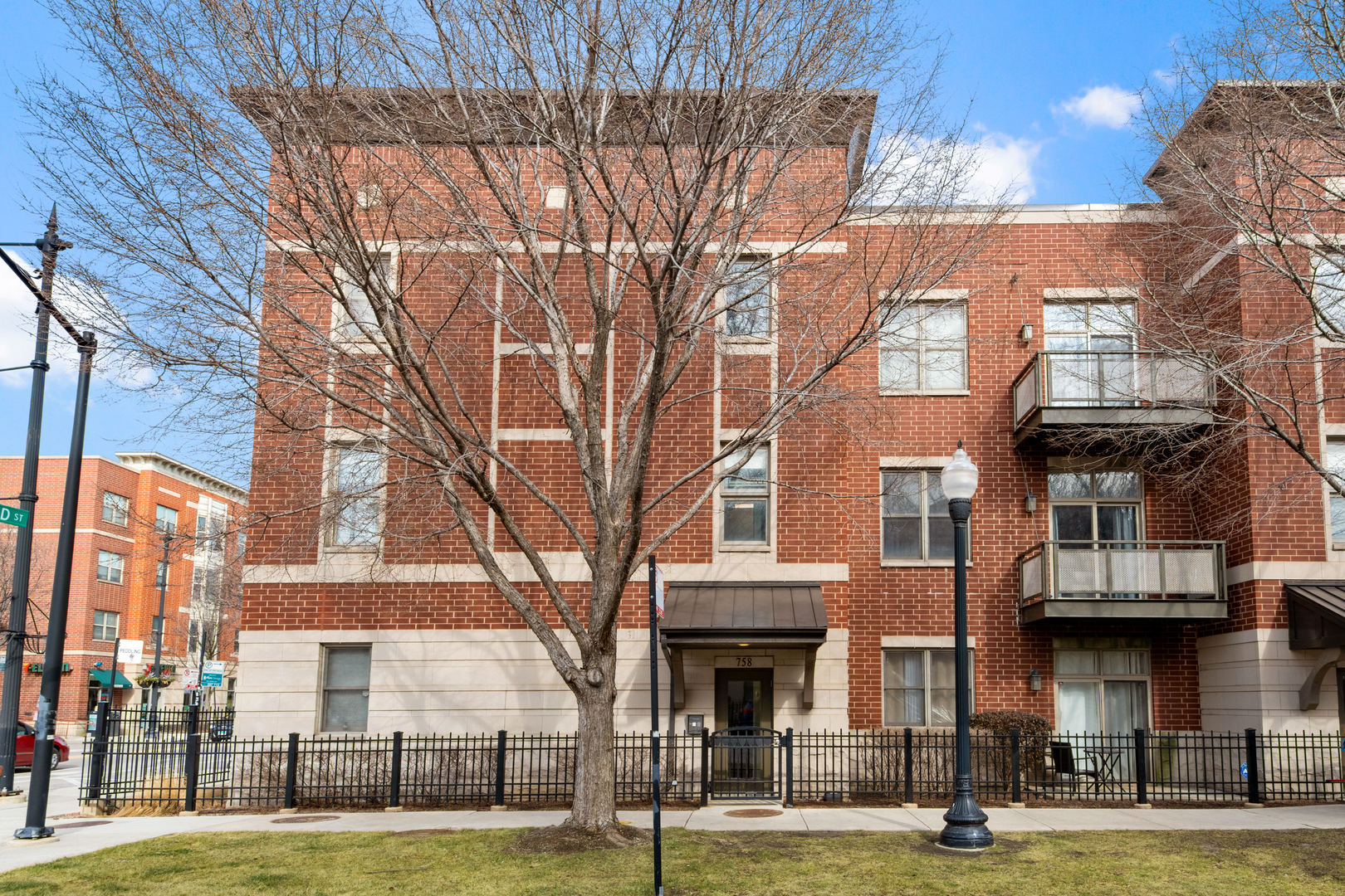 758 West 14th Street, Unit 303 Chicago, IL 60607 - Photo 1 of 9 a view of a building with a street