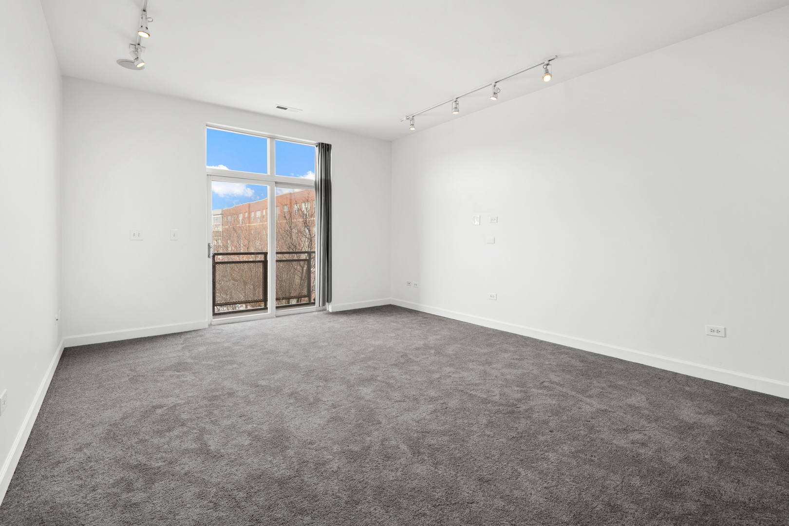 758 West 14th Street, Unit 303 Chicago, IL 60607 - Photo 2 of 9 a view of an empty room with a window