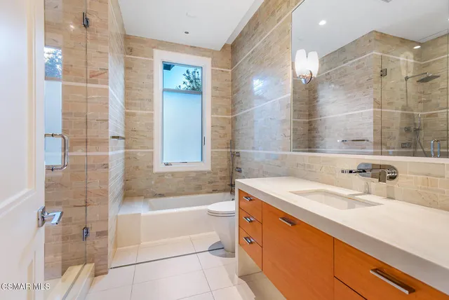 a bathroom with a sink and a bathtub