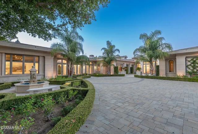 a house view with a outdoor space