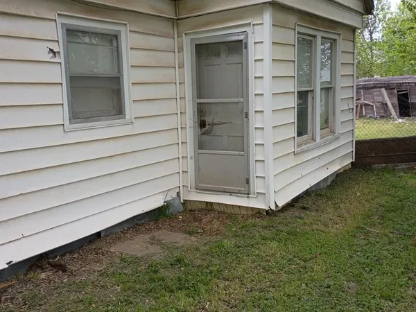 a view of front door and porch