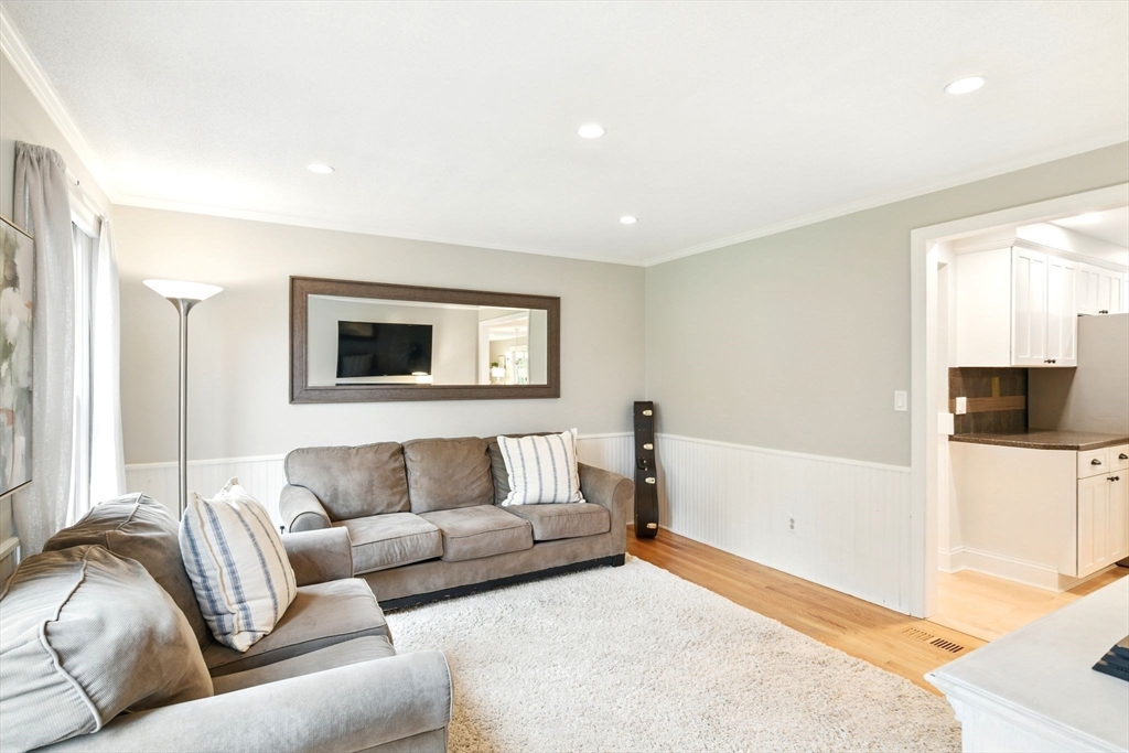 3 Pine Knoll Road Southwick, MA 01077 - Photo 18 of 42 a living room with a couch and a flat screen tv