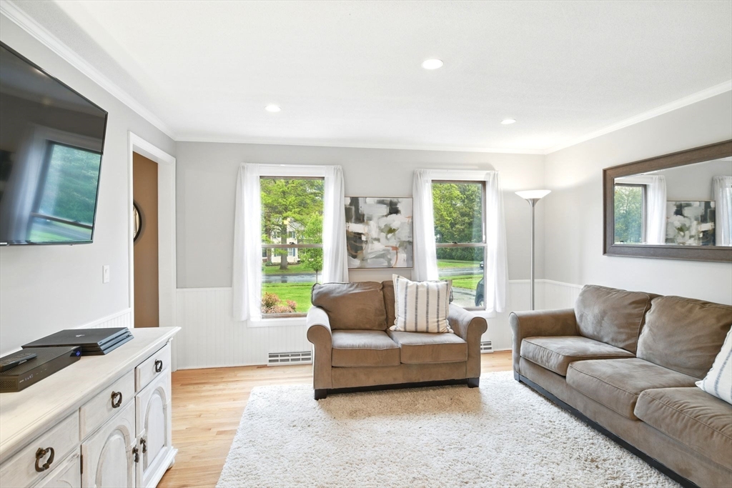 3 Pine Knoll Road Southwick, MA 01077 - Photo 19 of 42 a living room with furniture and a large window