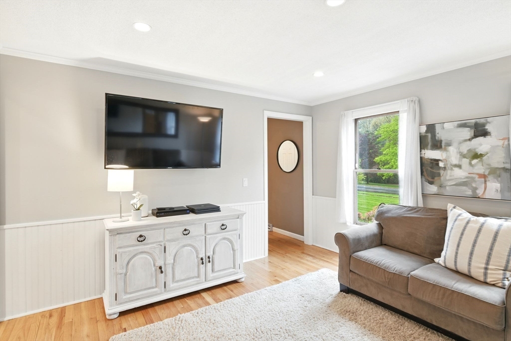 3 Pine Knoll Road Southwick, MA 01077 - Photo 20 of 42 a living room with furniture a flat screen tv and a window