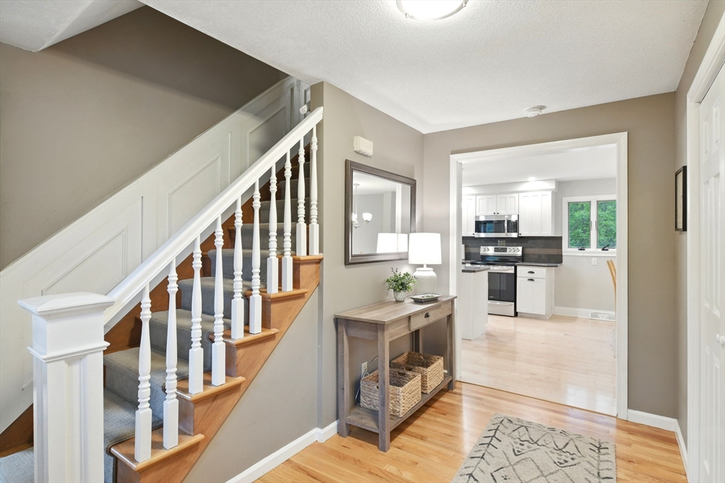 3 Pine Knoll Road Southwick, MA 01077 - Photo 2 of 42 a view of a living room with stainless steel appliances kitchen island granite countertop furniture
