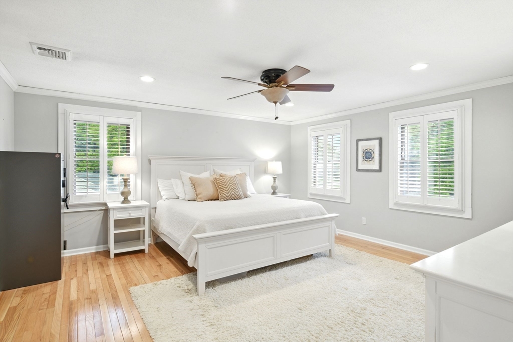 3 Pine Knoll Road Southwick, MA 01077 - Photo 23 of 42 a spacious bedroom with a bed and a large window
