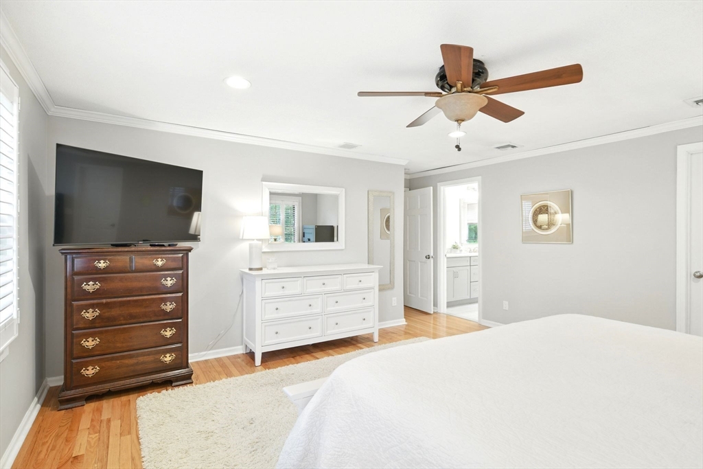 3 Pine Knoll Road Southwick, MA 01077 - Photo 25 of 42 a bedroom with a bed and a flat screen tv