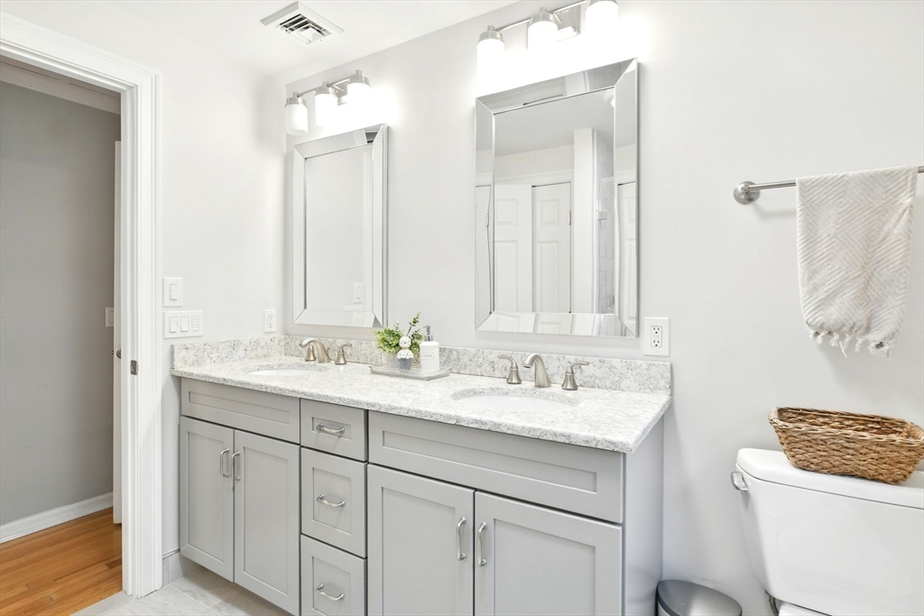 3 Pine Knoll Road Southwick, MA 01077 - Photo 26 of 42 a bathroom with a sink and a mirror