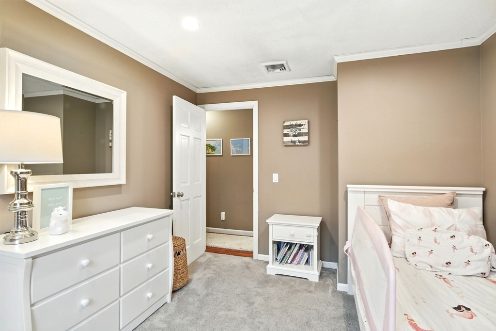 3 Pine Knoll Road Southwick, MA 01077 - Photo 30 of 42 a spacious bathroom with a double vanity sink a mirror and a bathtub