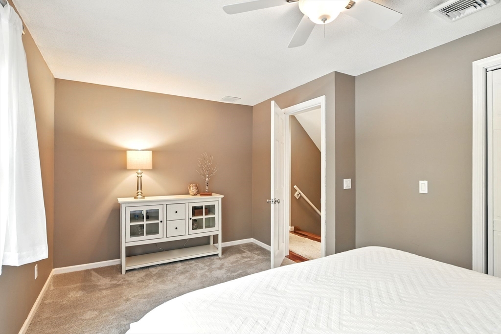 3 Pine Knoll Road Southwick, MA 01077 - Photo 34 of 42 a bedroom with a bed and a cabinets