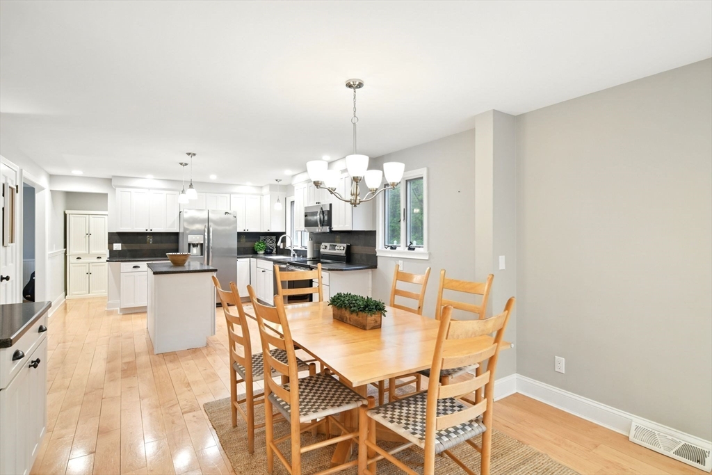 3 Pine Knoll Road Southwick, MA 01077 - Photo 10 of 42 a dining room with furniture and chandelier