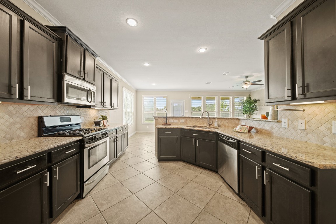 13230 Dover Bluff Drive Rosharon, TX 77583 - Photo 12 of 33 Lots of cabinets and counterspace