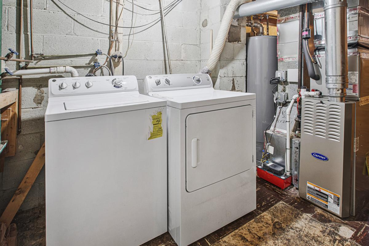 1016 Winsford Road Towson, MD 21204 - Photo 33 of 42 a utility room with dryer and washer