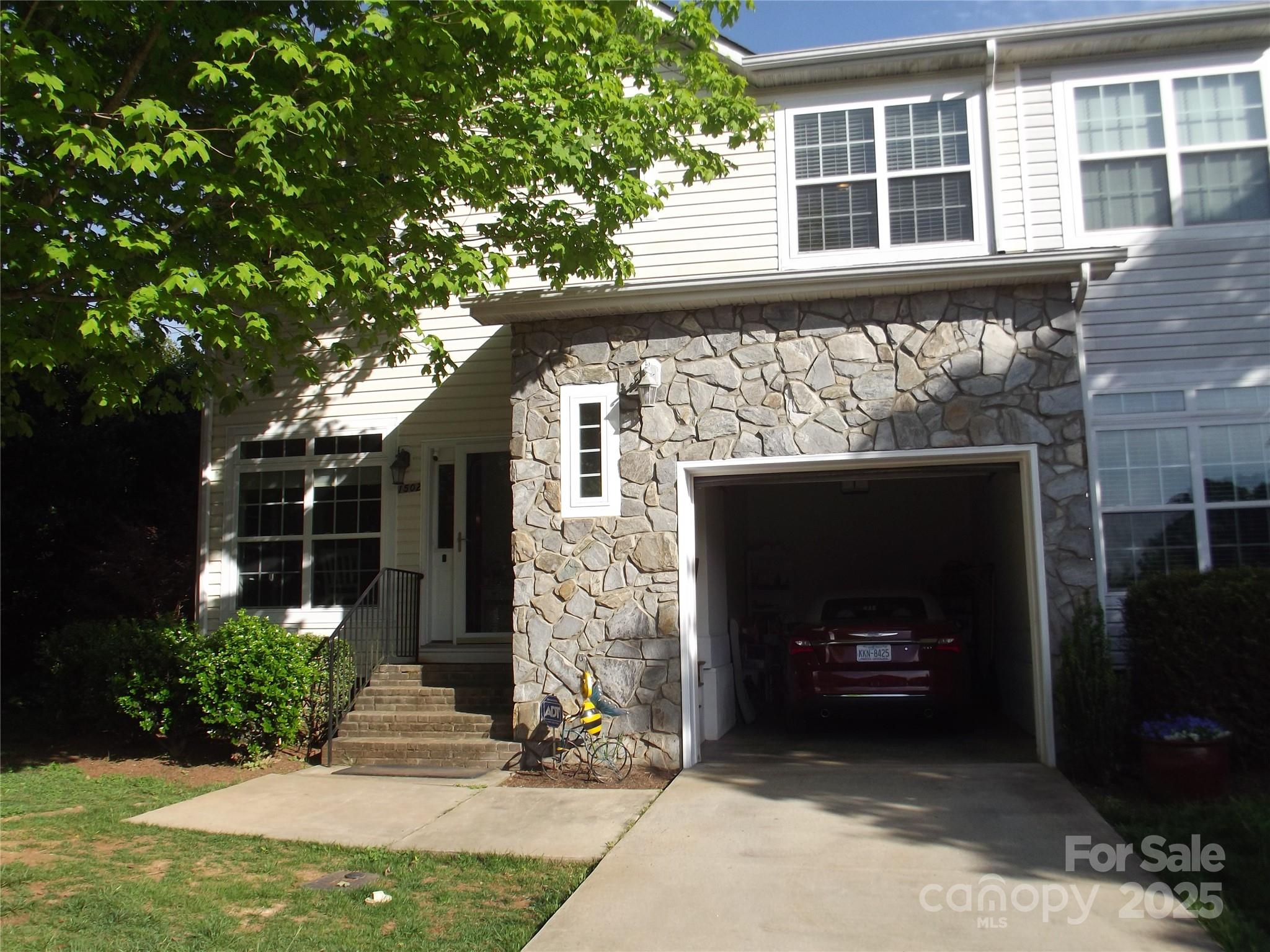1502 Mulberry Ridge Drive, Unit 1 Newton, NC 28658 - Photo 1 of 39 a front view of a house with a yard