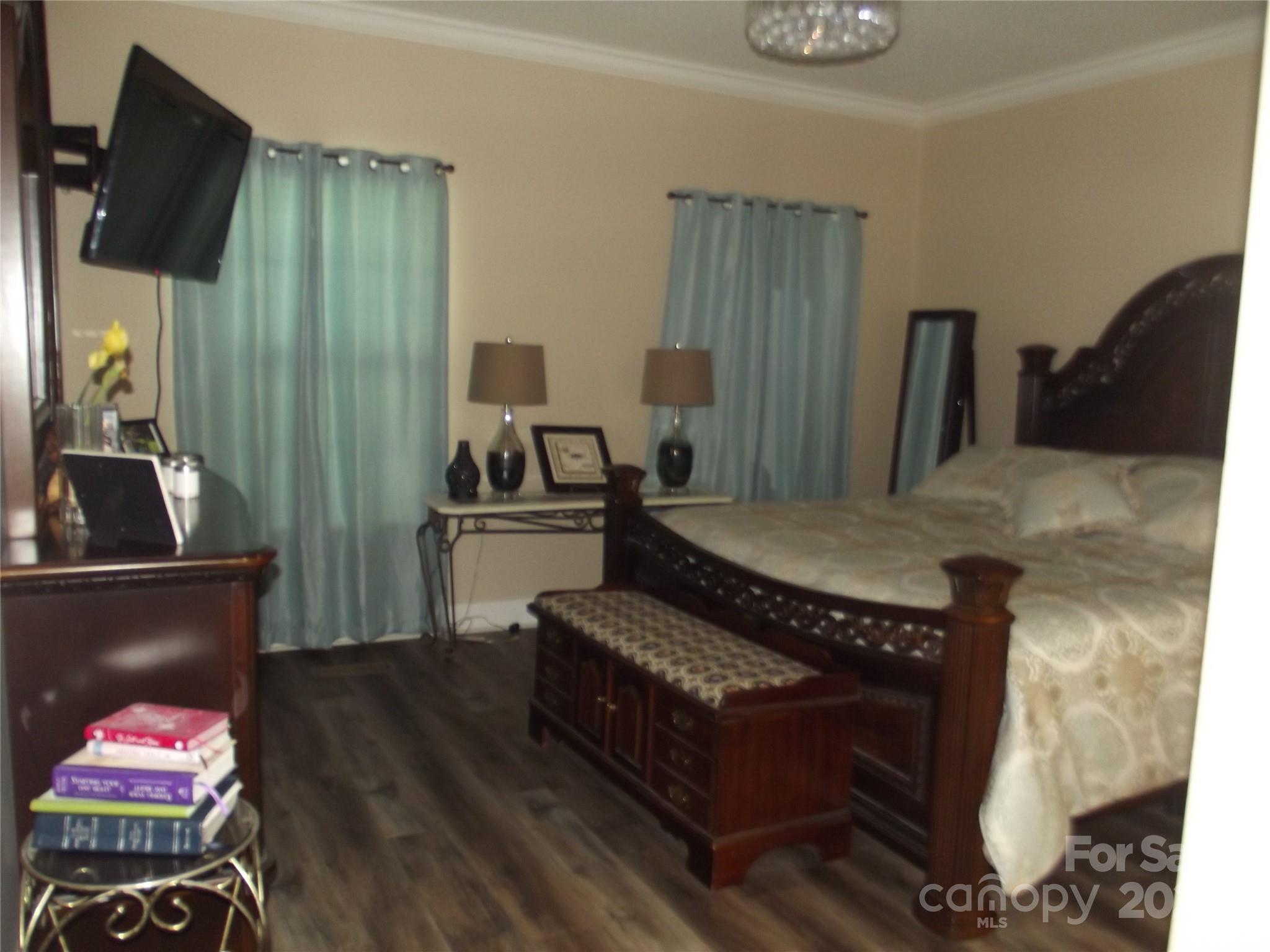1502 Mulberry Ridge Drive, Unit 1 Newton, NC 28658 - Photo 16 of 39 a living room with furniture and a flat screen tv