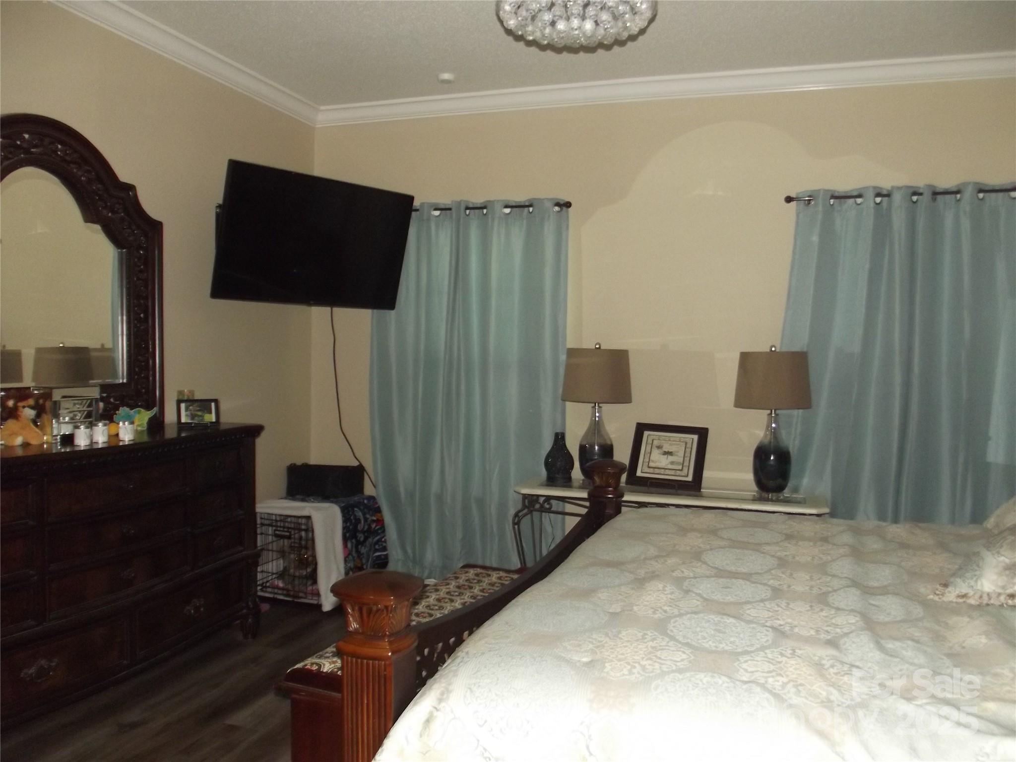 1502 Mulberry Ridge Drive, Unit 1 Newton, NC 28658 - Photo 17 of 39 a bedroom with a bed and a mirror