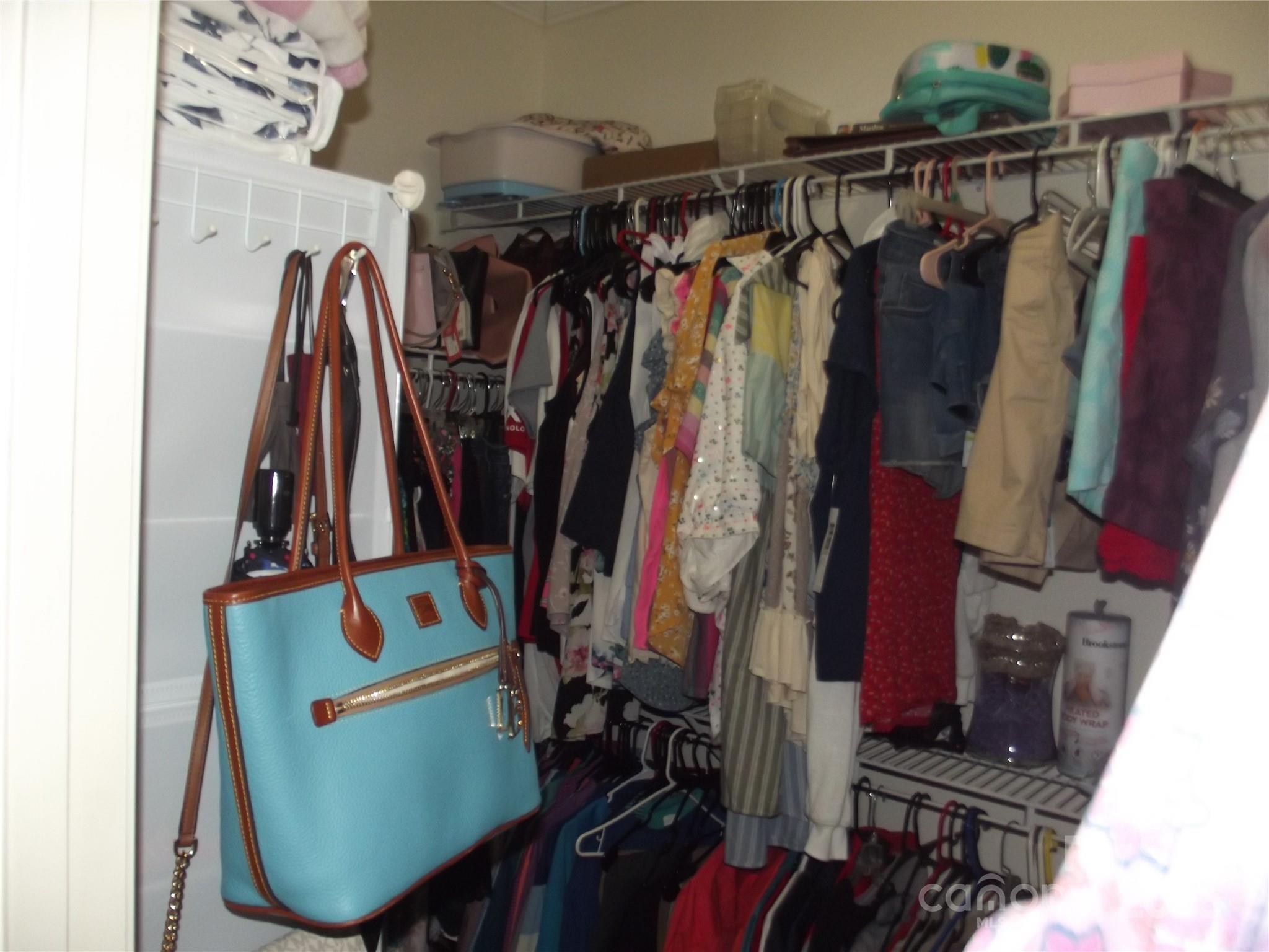 1502 Mulberry Ridge Drive, Unit 1 Newton, NC 28658 - Photo 21 of 39 a view of walk in closet with clothes