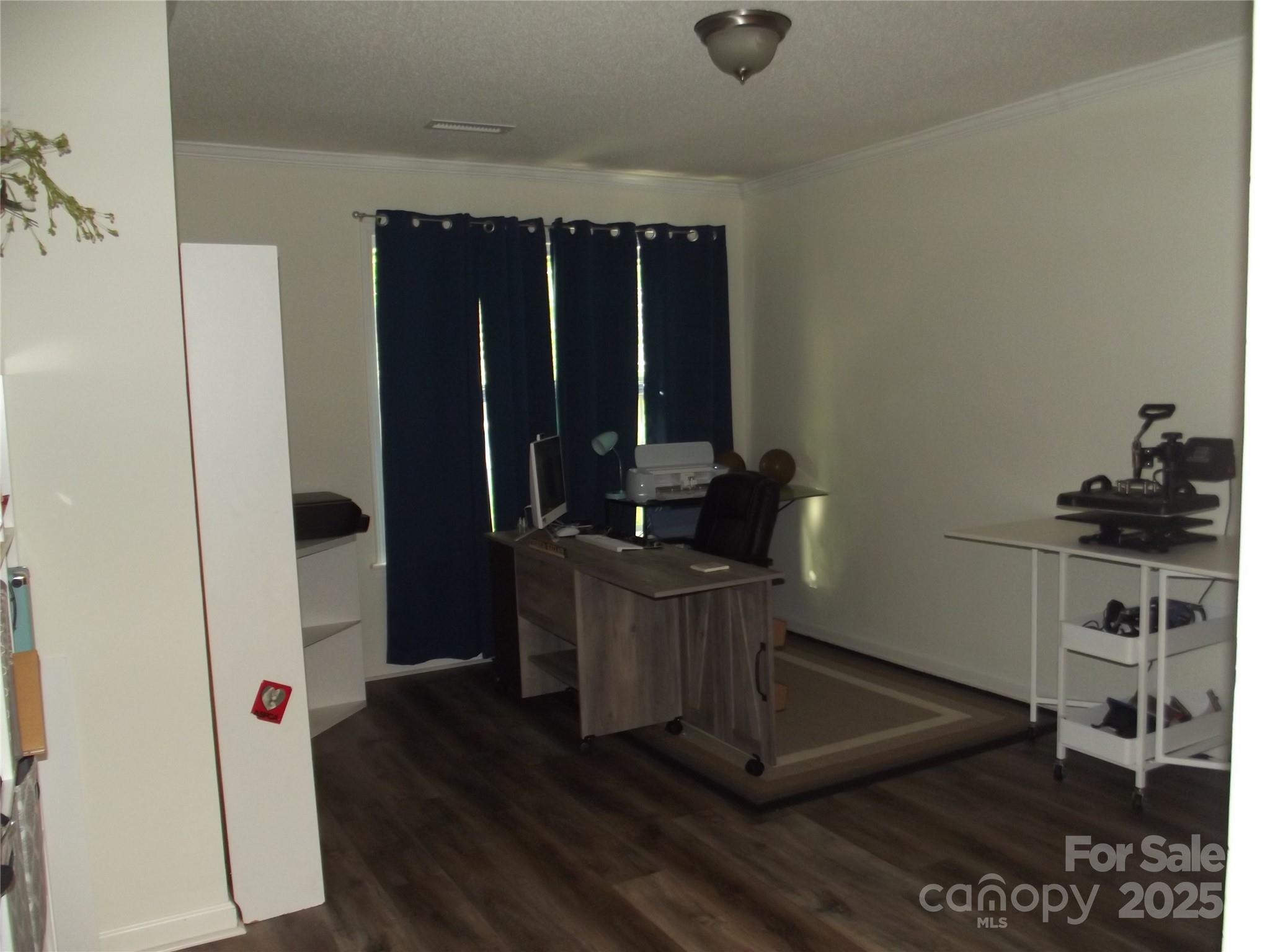 1502 Mulberry Ridge Drive, Unit 1 Newton, NC 28658 - Photo 28 of 39 a view of a workspace with furniture and wooden floor