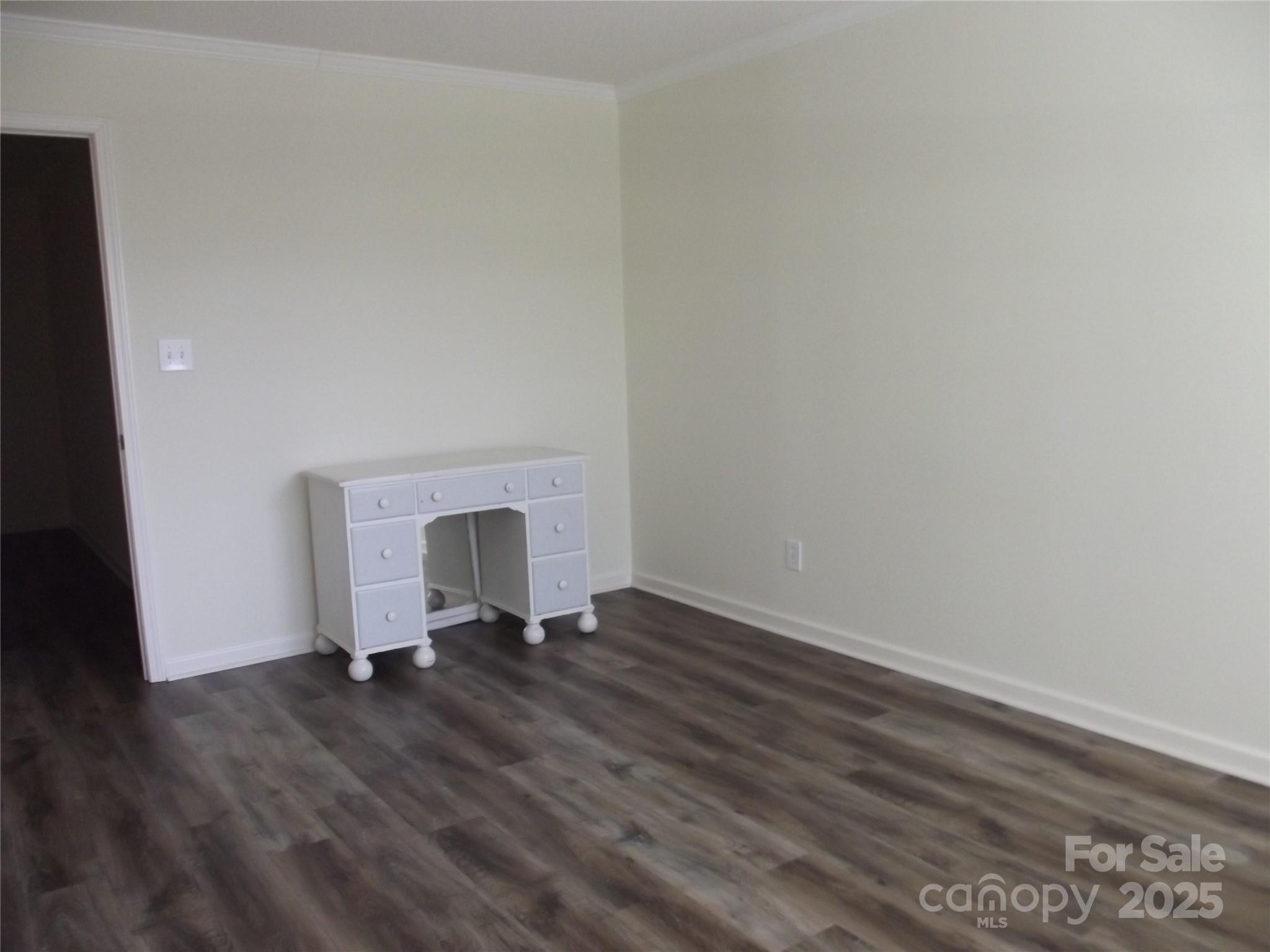 1502 Mulberry Ridge Drive, Unit 1 Newton, NC 28658 - Photo 33 of 39 a view of empty room with wooden floor