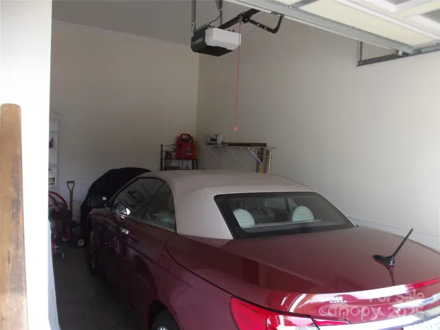 a bathroom with a toilet a sink and a mirror