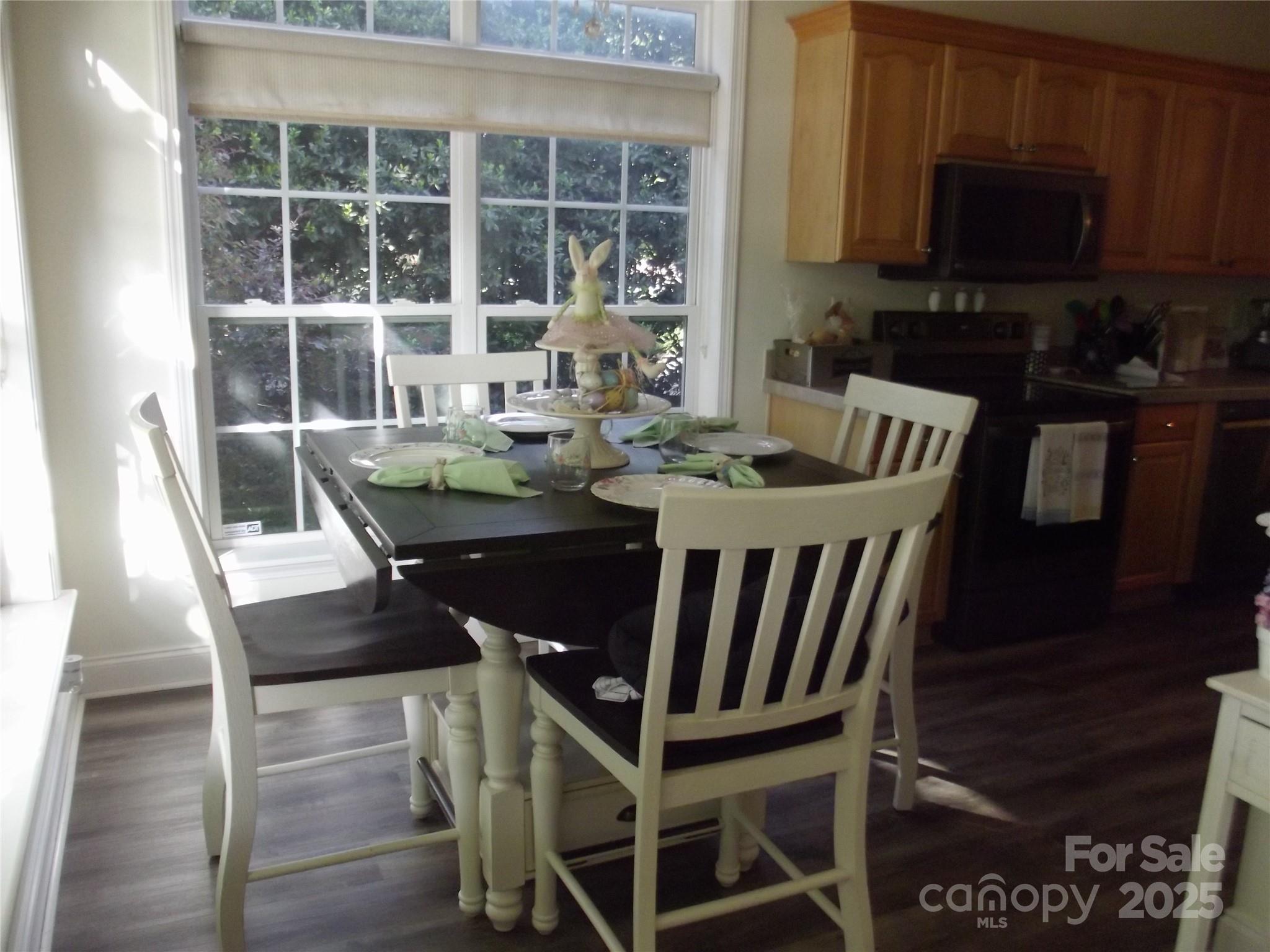 1502 Mulberry Ridge Drive, Unit 1 Newton, NC 28658 - Photo 4 of 39 a view of a dining room with furniture window and outside view