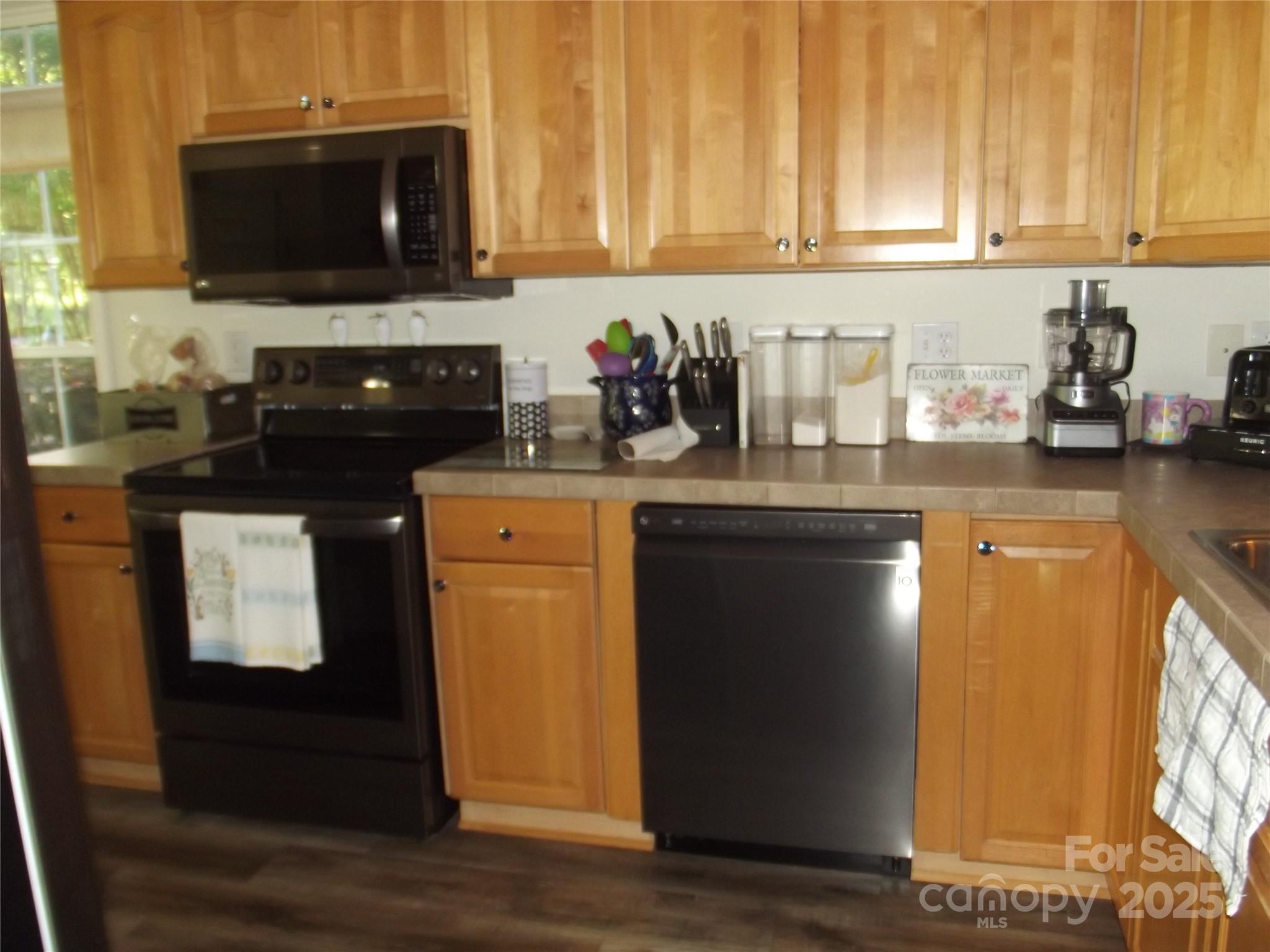 1502 Mulberry Ridge Drive, Unit 1 Newton, NC 28658 - Photo 6 of 39 a kitchen with a sink and cabinets