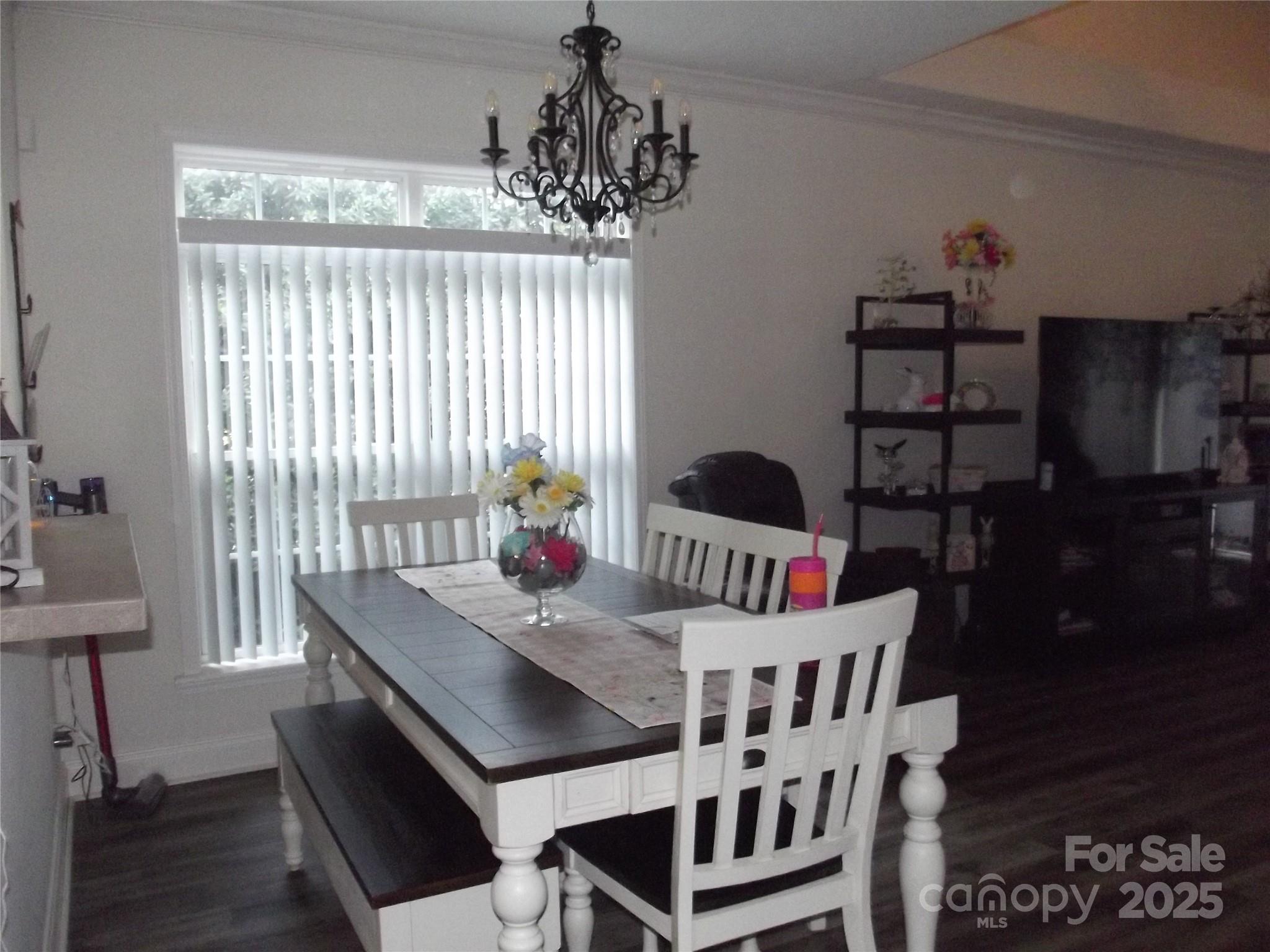 1502 Mulberry Ridge Drive, Unit 1 Newton, NC 28658 - Photo 10 of 39 a view of a dining room with furniture and wooden floor