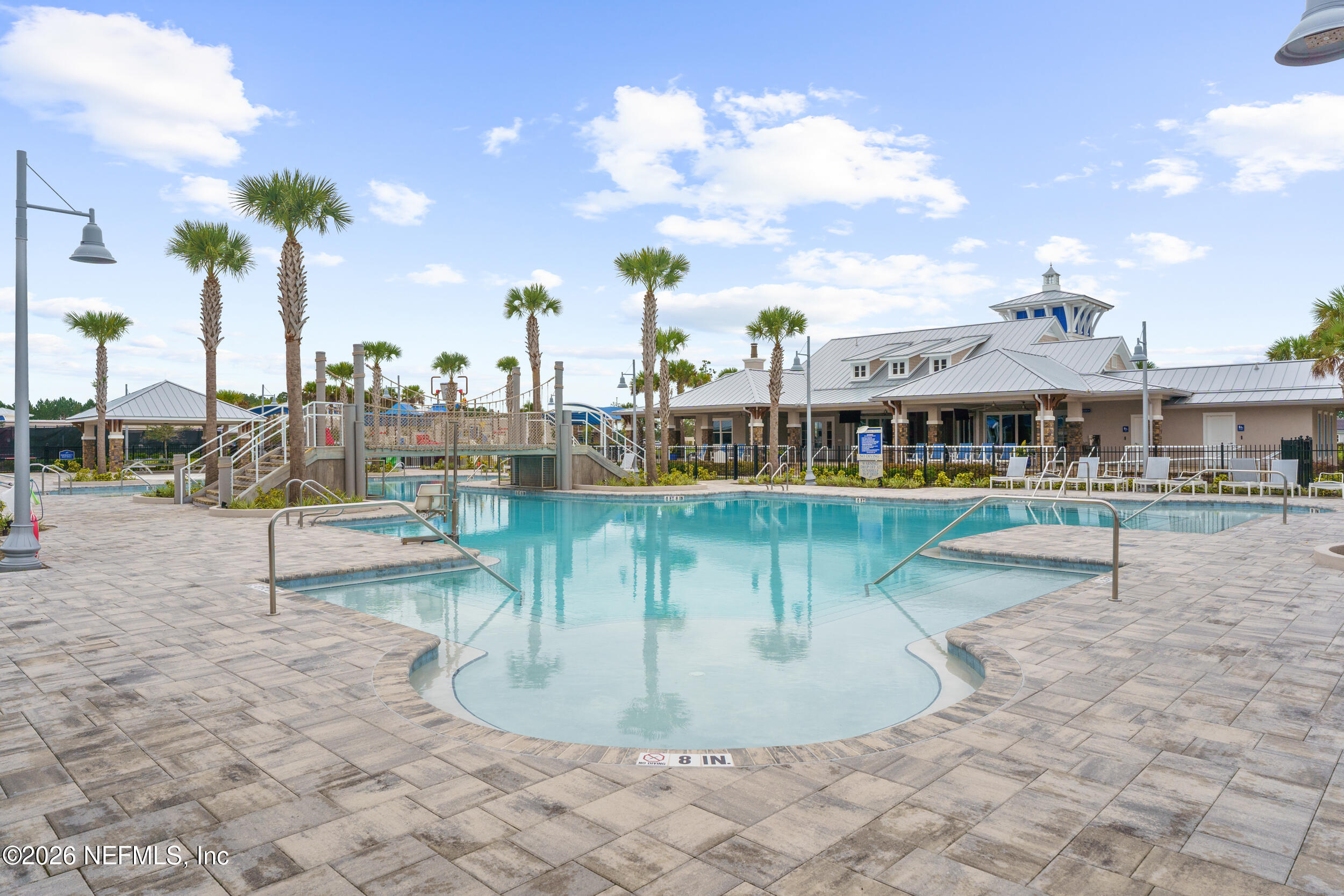57 Cedar Elm Way St. Augustine, FL 32092 - Photo 58 of 65 a view of a swimming pool with a patio