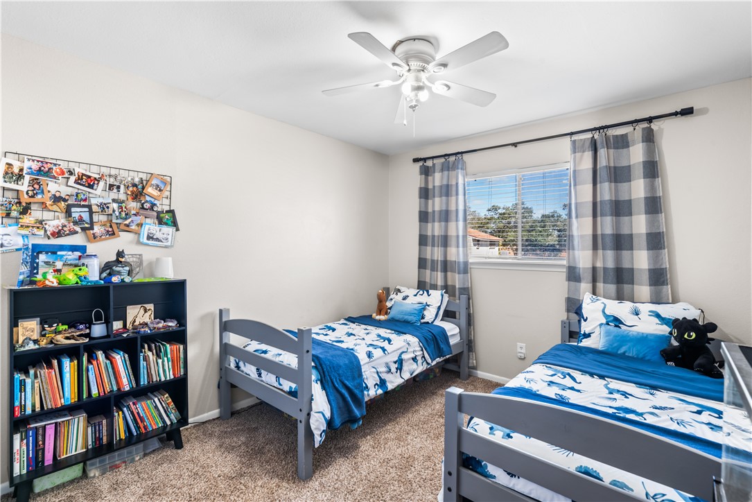 4036 Ogrady Drive Corpus Christi, TX 78413 - Photo 15 of 22 a bedroom with furniture and a book shelf