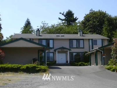 3210 Morrison Road West University Place, WA 98466 - Photo 1 of 1 a front view of a house with a garden
