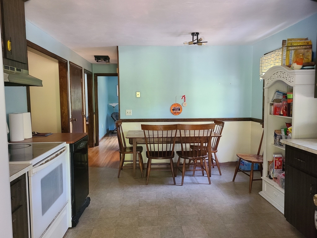 131 Holly Ridge Drive Hanson, MA 02341 - Photo 11 of 36 a dining room with furniture and window