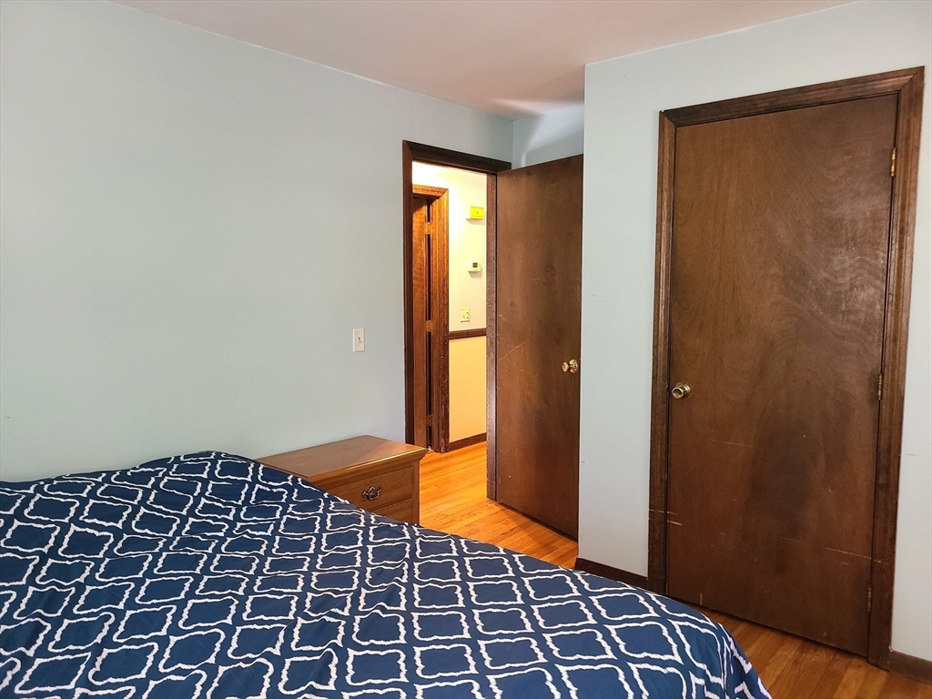 131 Holly Ridge Drive Hanson, MA 02341 - Photo 14 of 36 a view of an empty room with a window